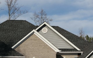 Read more about the article Should You Be Concerned About Asphalt Shingle Granules in the Gutter?