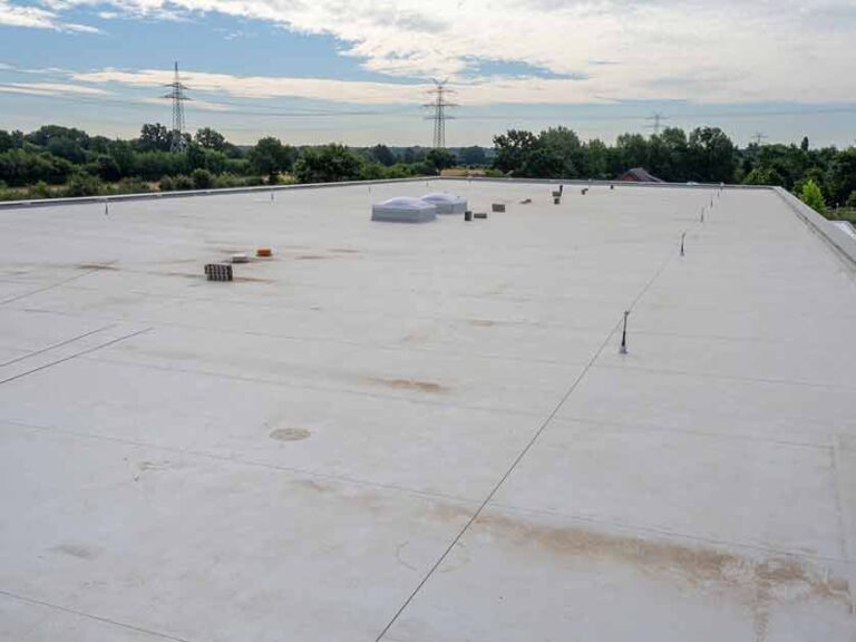 Read more about the article What Are the Usual Causes of Commercial Roof Damage?